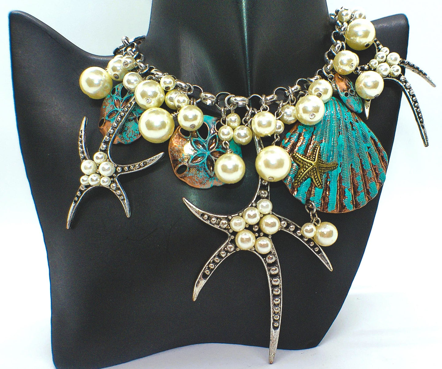 https://www.artistryjewelry.net/products/starfish-and-shell-statement-necklaces-set