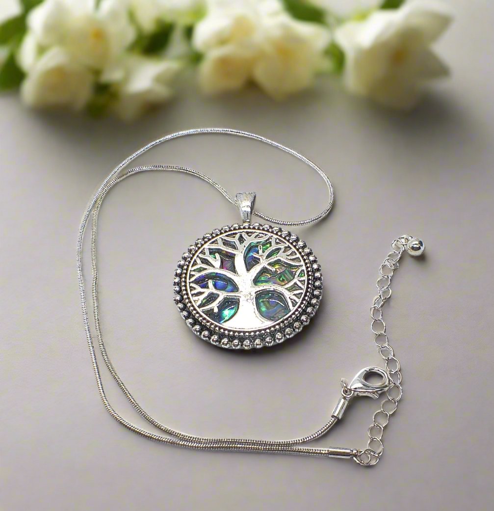https://www.artistryjewelry.net/products/abalone-tree-of-life-pendant-necklace