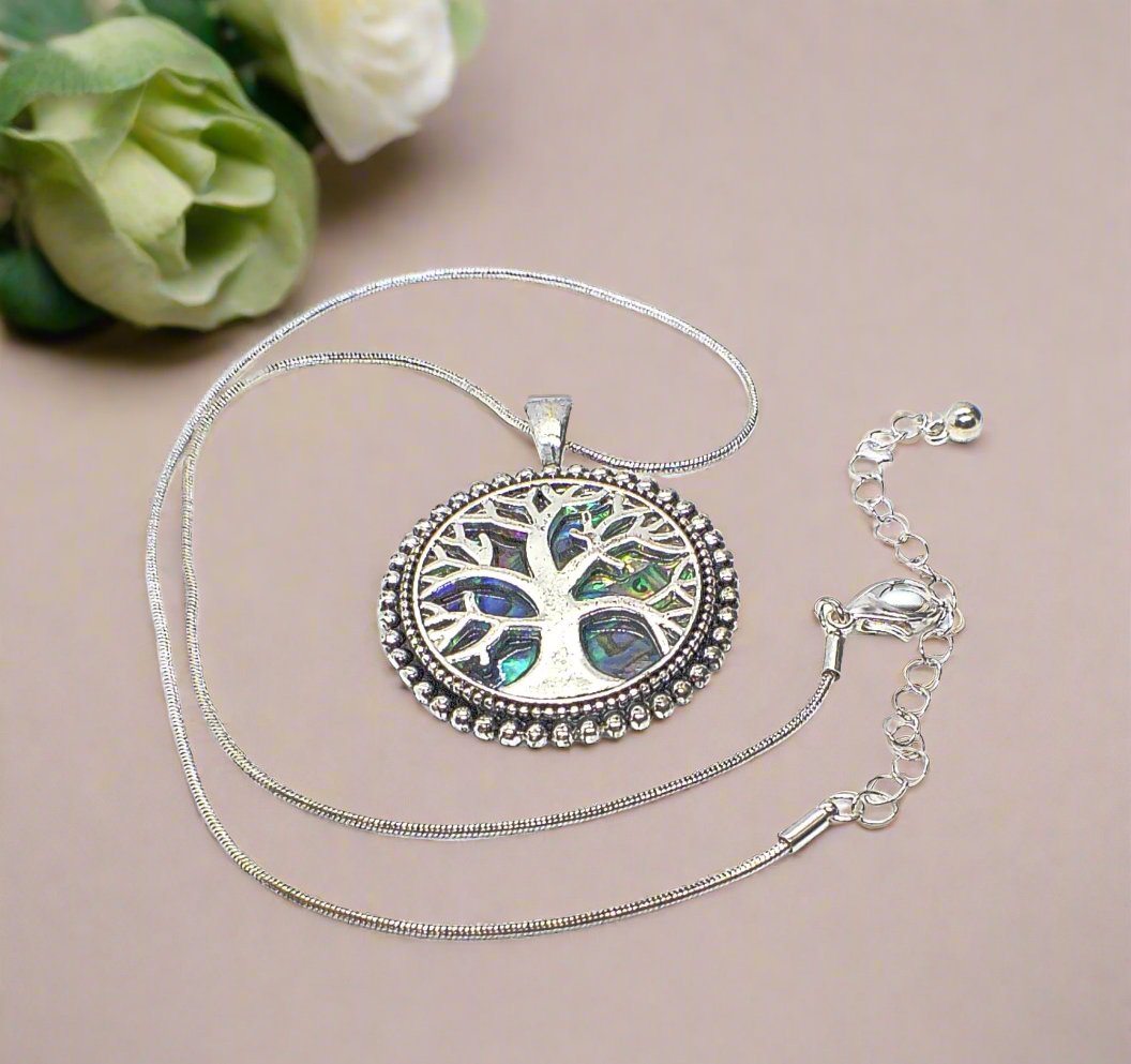 https://www.artistryjewelry.net/products/abalone-tree-of-life-pendant-necklace