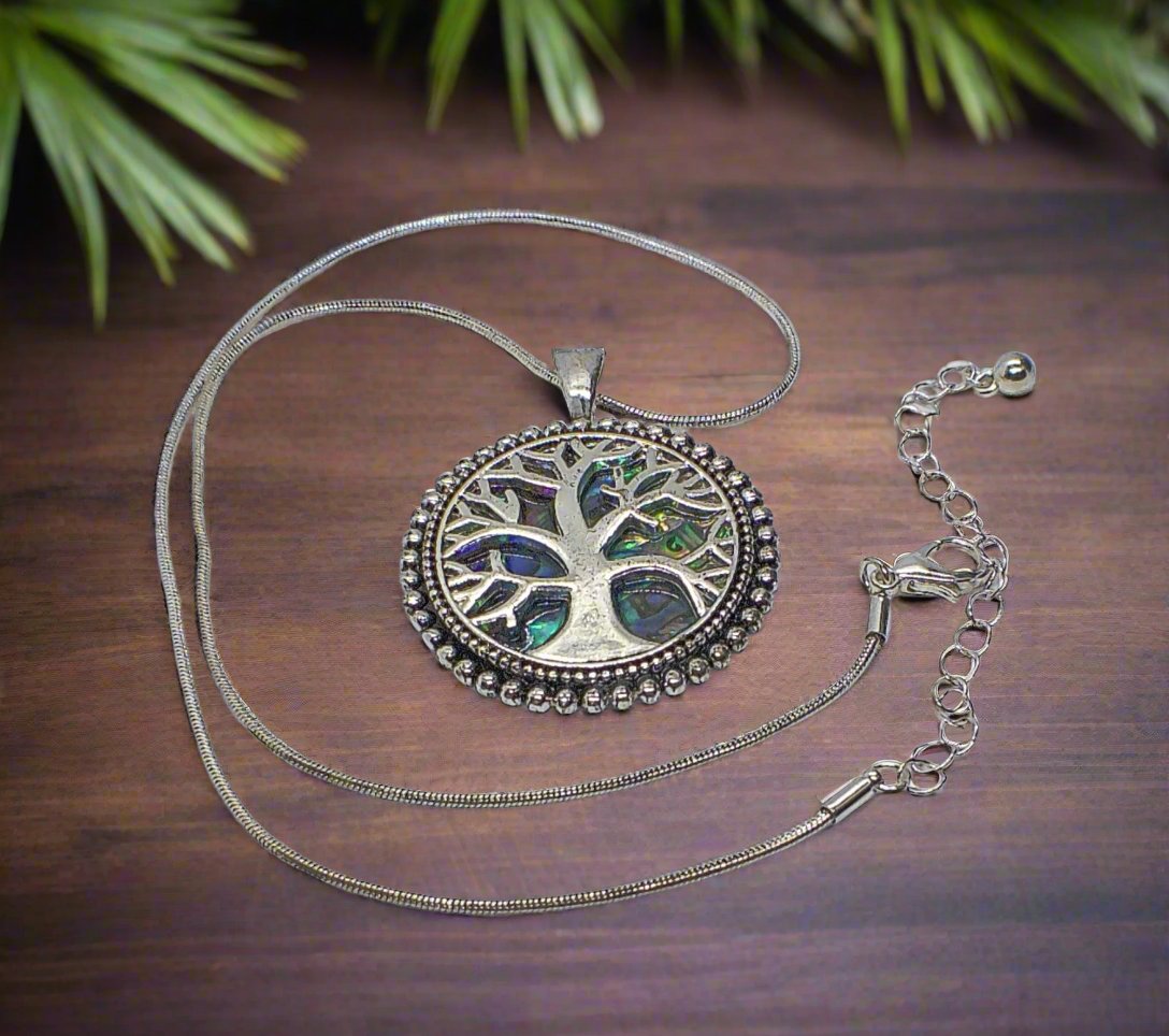 https://www.artistryjewelry.net/products/abalone-tree-of-life-pendant-necklace