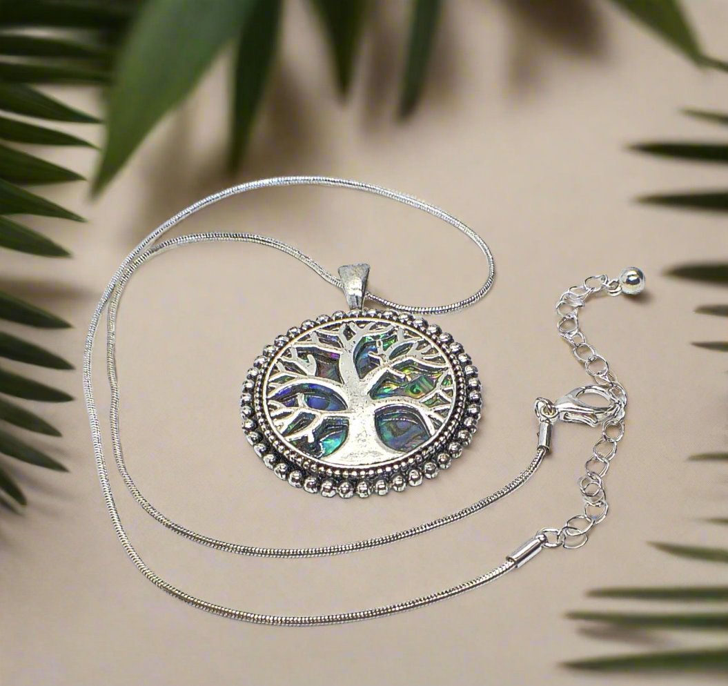 https://www.artistryjewelry.net/products/abalone-tree-of-life-pendant-necklace
