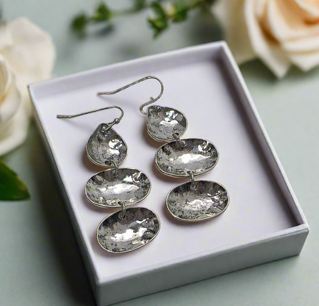 https://www.artistryjewelry.net/products/multi-disc-drop-earrings