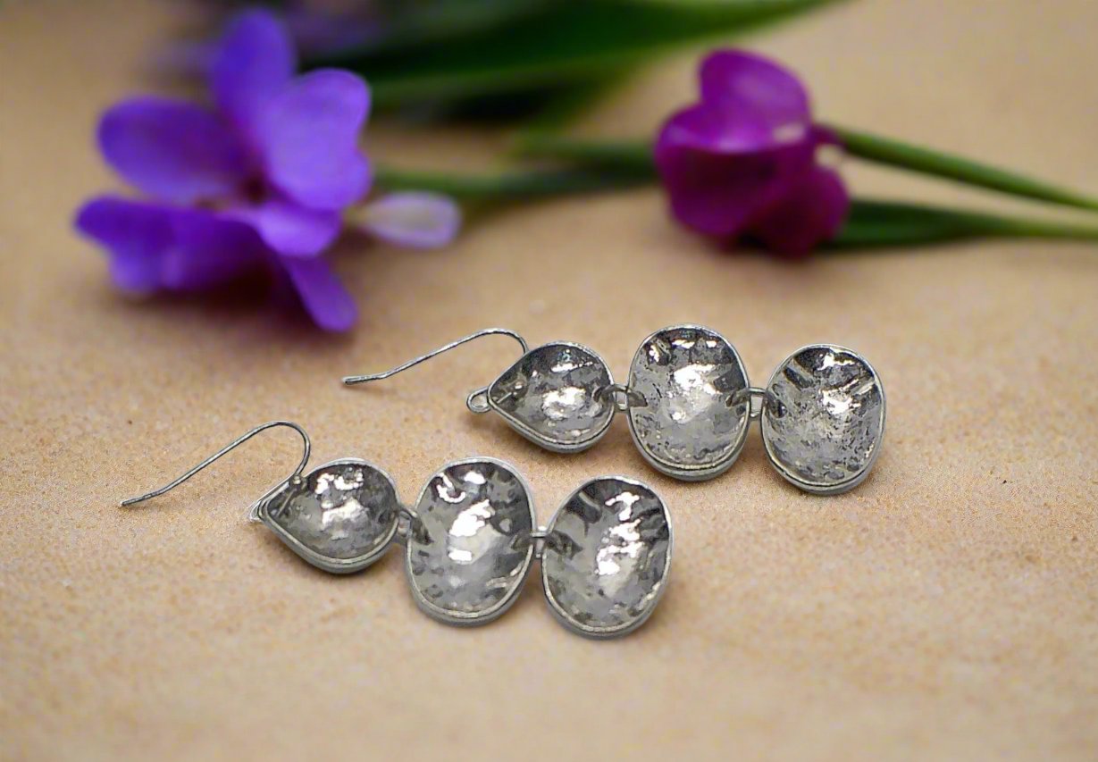 https://www.artistryjewelry.net/products/multi-disc-drop-earrings