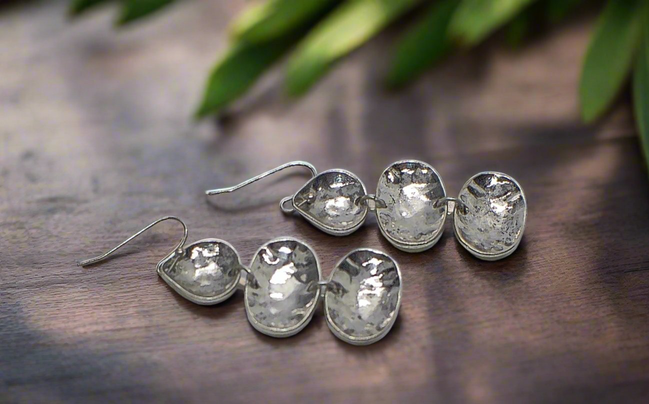 https://www.artistryjewelry.net/products/multi-disc-drop-earrings