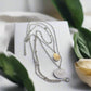 https://www.artistryjewelry.net/products/silver-shell-multilayer-necklace