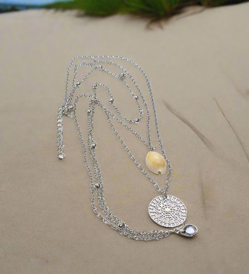 https://www.artistryjewelry.net/products/silver-shell-multilayer-necklace