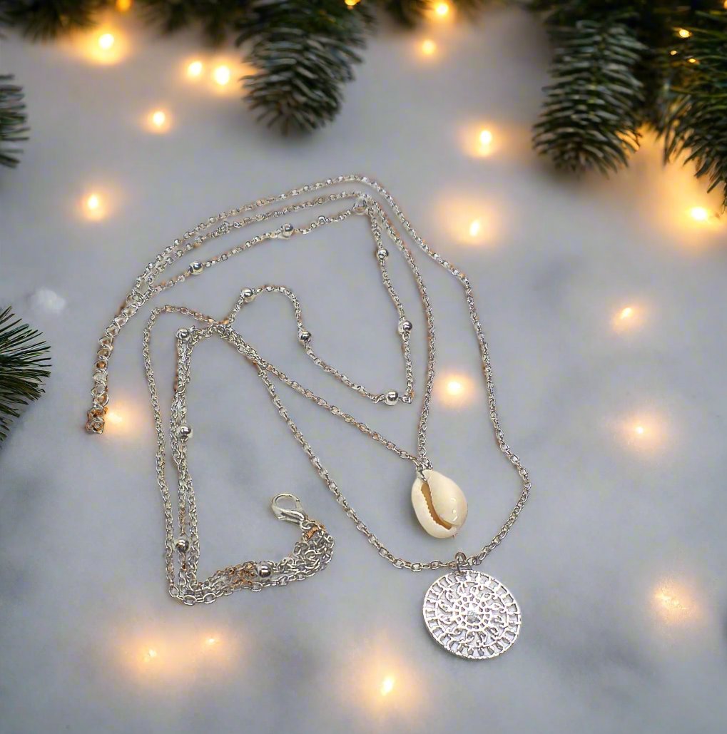 https://www.artistryjewelry.net/products/silver-shell-multilayer-necklace