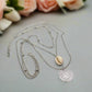 https://www.artistryjewelry.net/products/silver-shell-multilayer-necklace