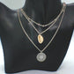 https://www.artistryjewelry.net/products/silver-shell-multilayer-necklace