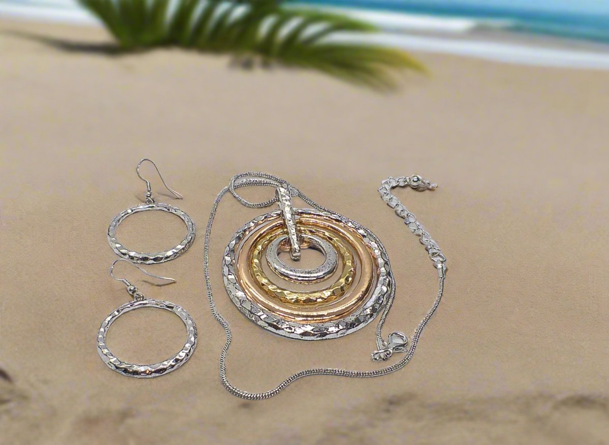 https://www.artistryjewelry.net/products/fantastic-hammered-circles-necklace-set
