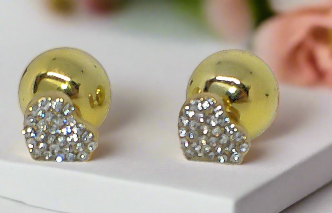 https://www.artistryjewelry.net/products/gold-heart-double-sided-earrings