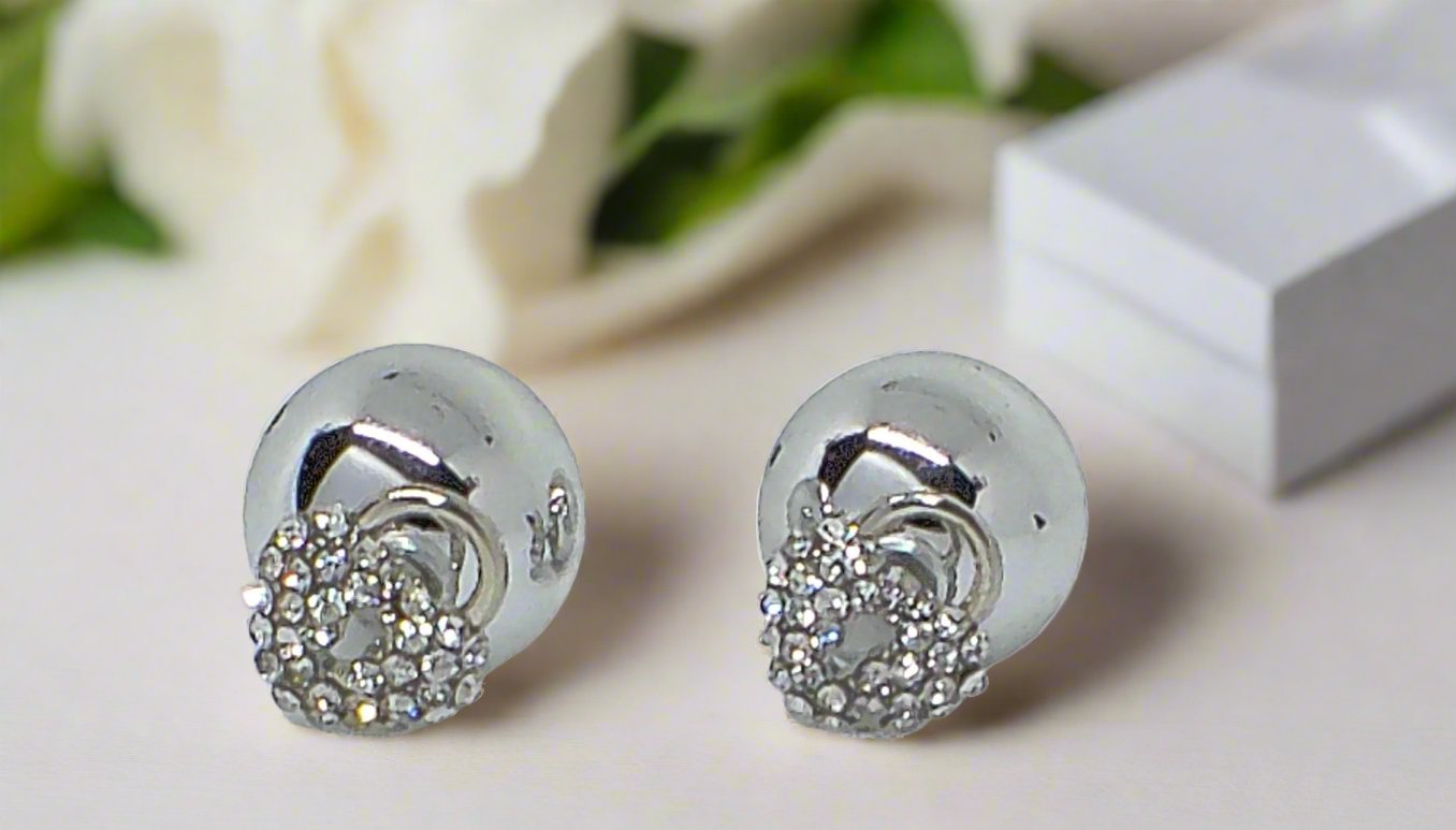 https://www.artistryjewelry.net/products/heart-shaped-double-sided-earrings