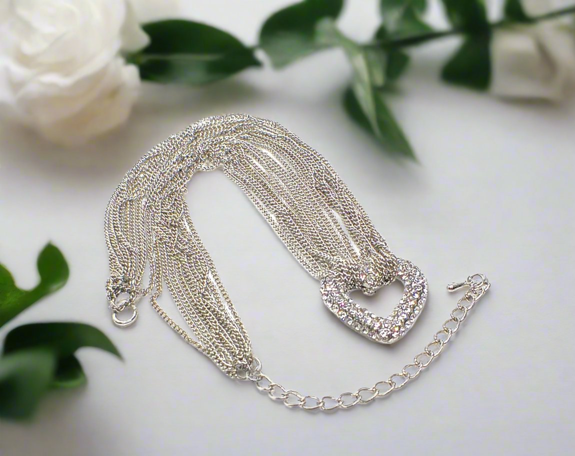 https://www.artistryjewelry.net/products/multi-chain-pave-heart-necklace