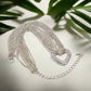 https://www.artistryjewelry.net/products/multi-chain-pave-heart-necklace