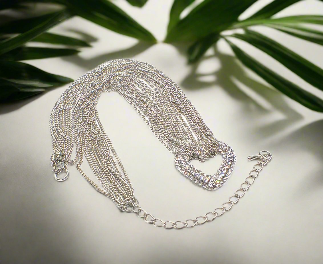 https://www.artistryjewelry.net/products/multi-chain-pave-heart-necklace
