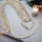 https://www.artistryjewelry.net/products/multi-chain-pave-heart-necklace