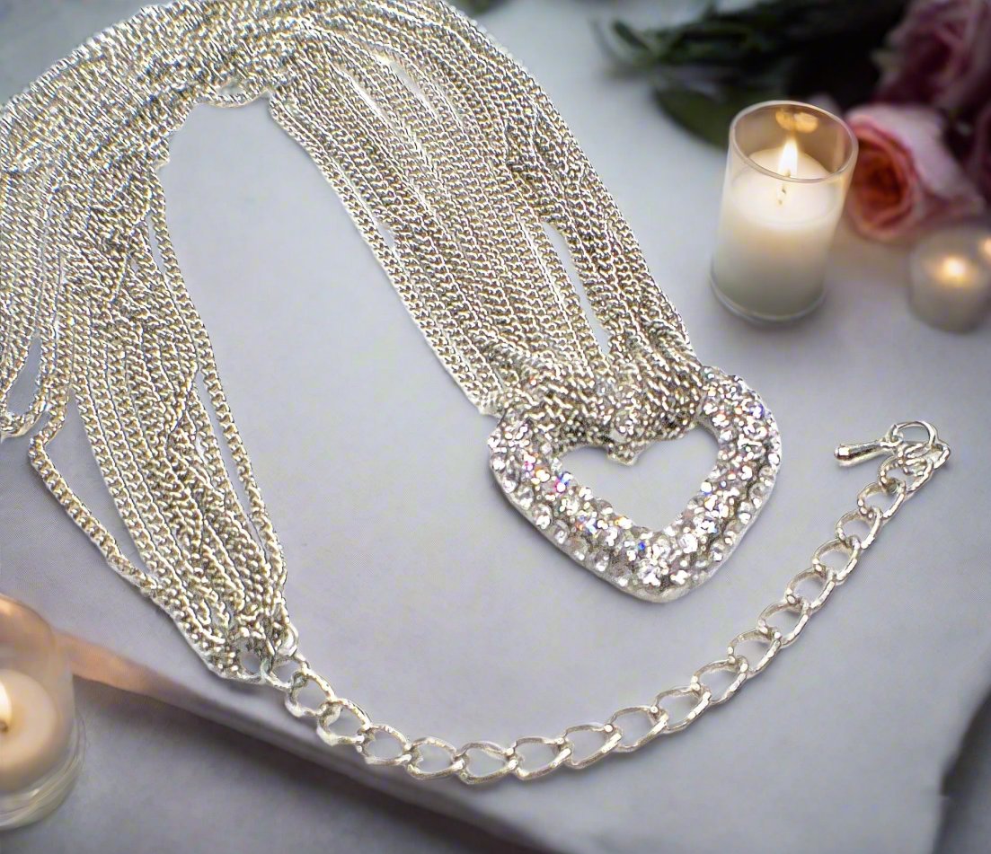 https://www.artistryjewelry.net/products/multi-chain-pave-heart-necklace