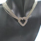 https://www.artistryjewelry.net/products/multi-chain-pave-heart-necklace