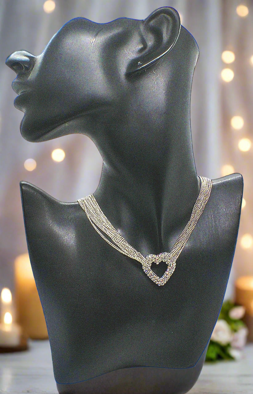 https://www.artistryjewelry.net/products/multi-chain-pave-heart-necklace