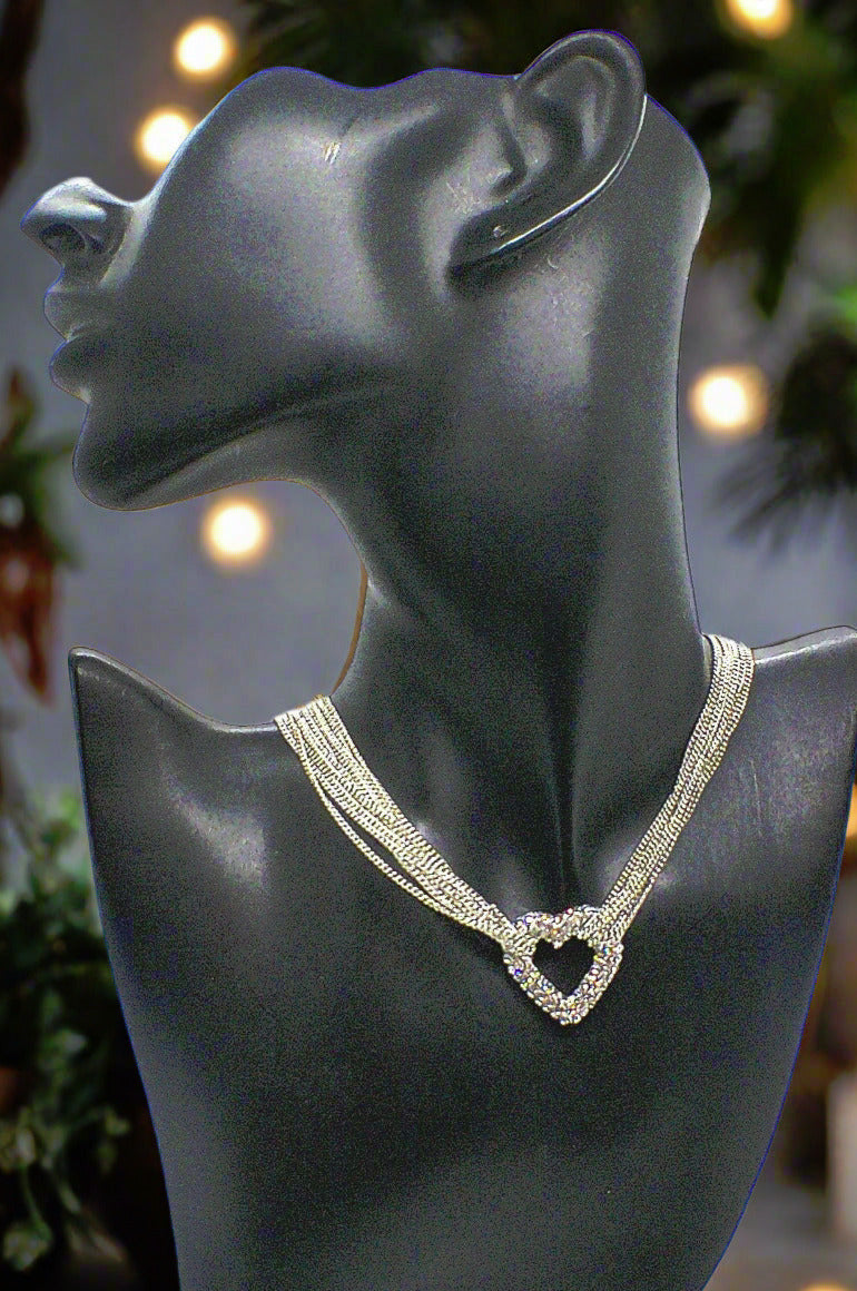 https://www.artistryjewelry.net/products/multi-chain-pave-heart-necklace