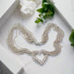 https://www.artistryjewelry.net/products/multi-chain-pave-heart-necklace