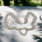 https://www.artistryjewelry.net/products/multi-chain-pave-heart-necklace