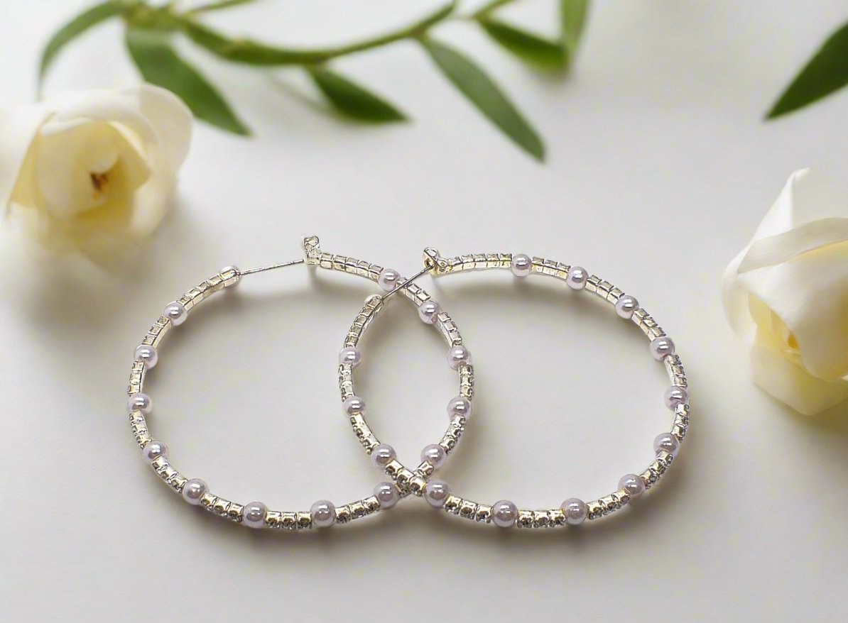 https://www.artistryjewelry.net/products/rhinestone-and-mini-pearl-earrings