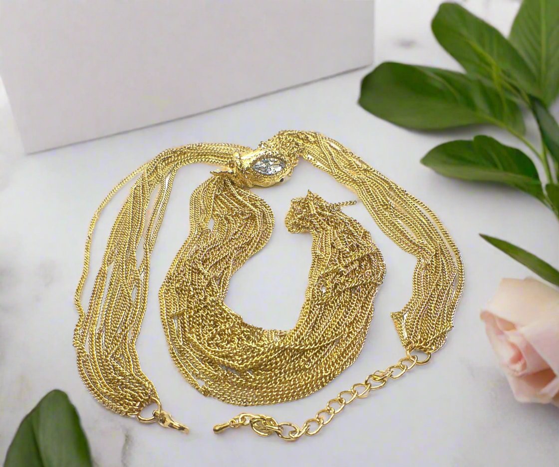 https://www.artistryjewelry.net/products/snake-head-necklace