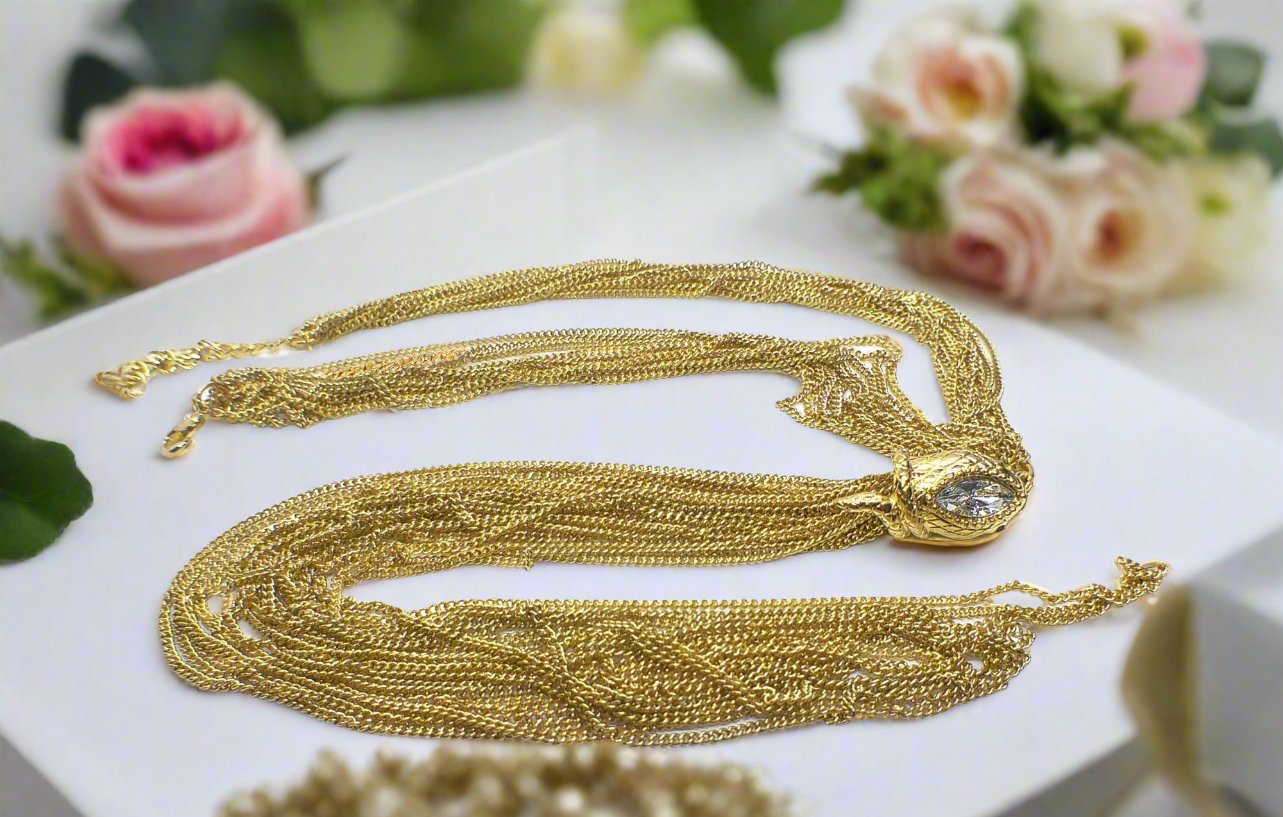 https://www.artistryjewelry.net/products/snake-head-necklace