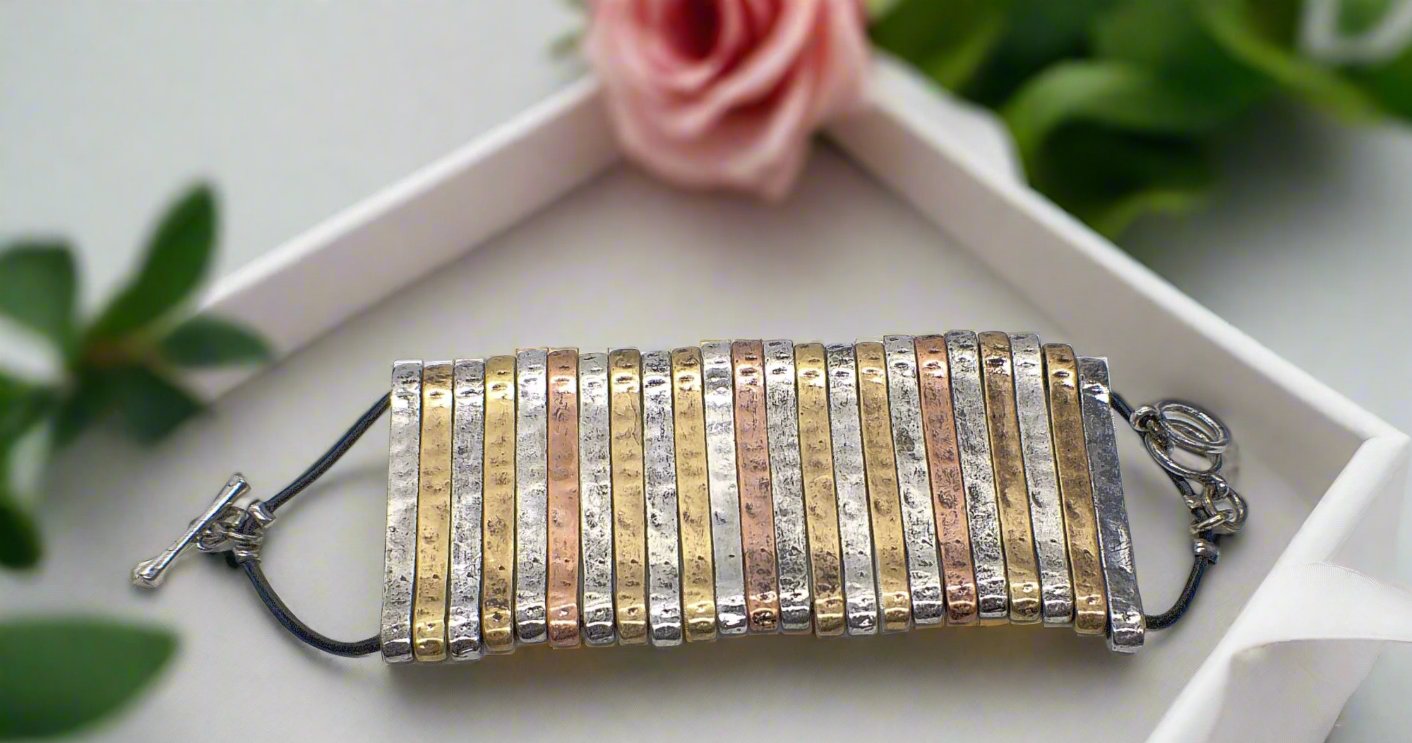 https://www.artistryjewelry.net/products/aged-finished-metal-bracelet