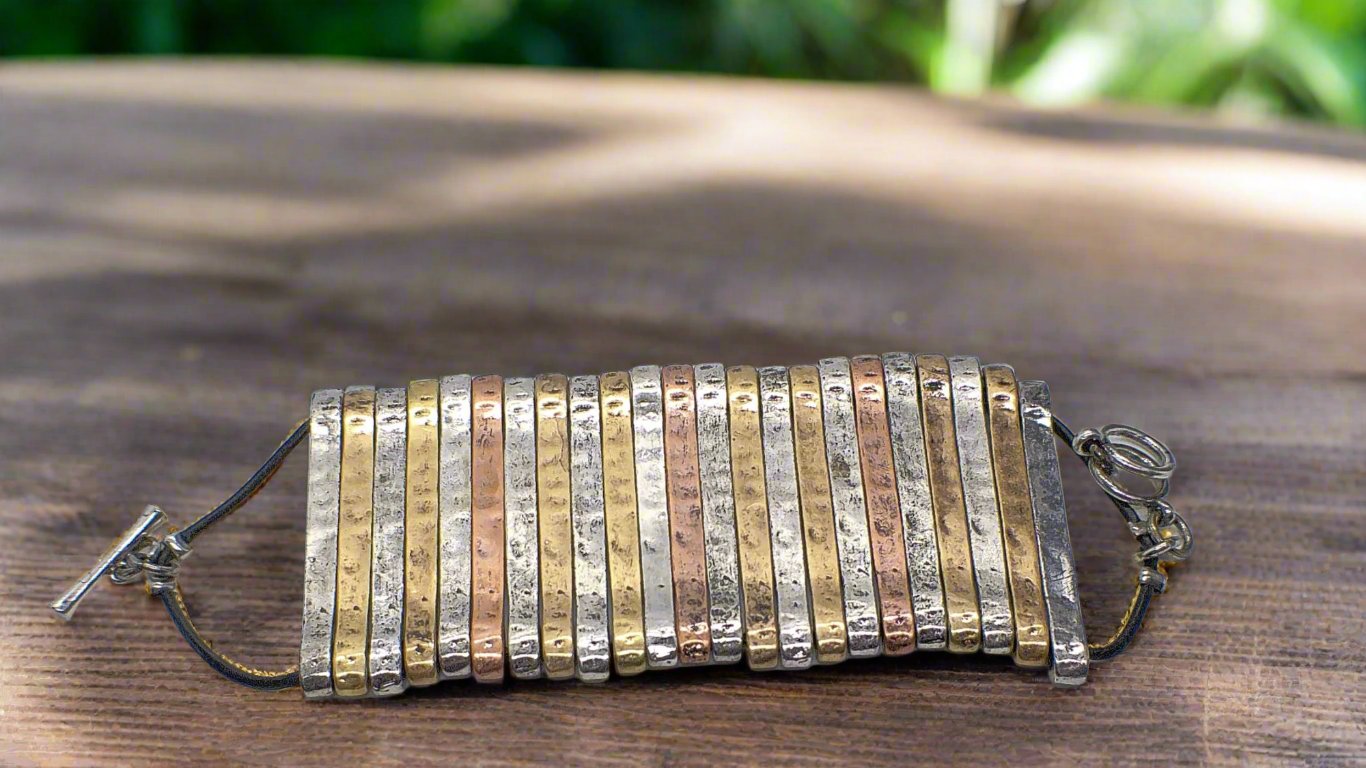 https://www.artistryjewelry.net/products/aged-finished-metal-bracelet