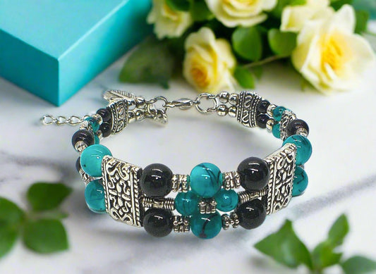 https://www.artistryjewelry.net/products/gorgeous-black-and-turquoise-bracelet