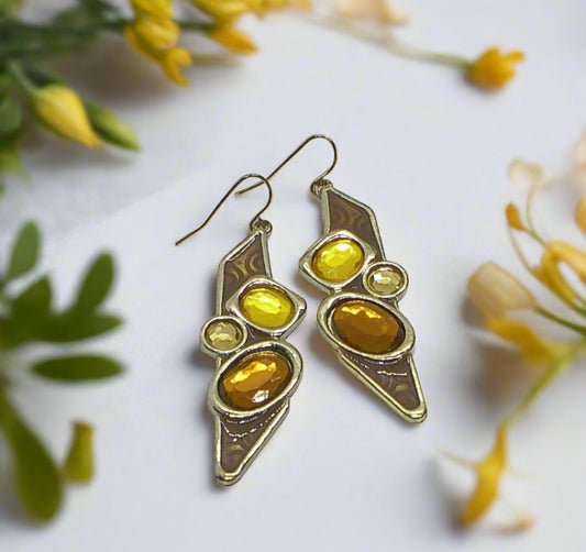 https://www.artistryjewelry.net/products/lovely-gold-dangle-earrings