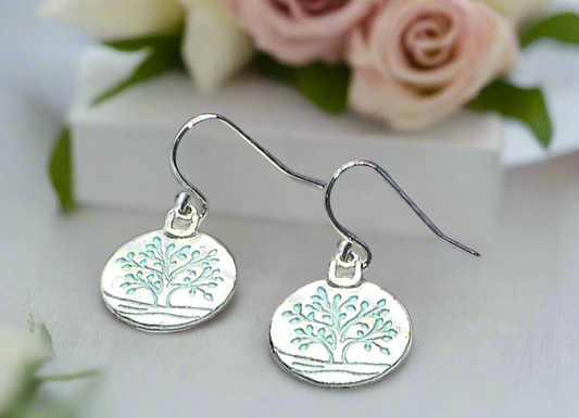 https://www.artistryjewelry.net/products/beautiful-silver-tree-of-life-earrings