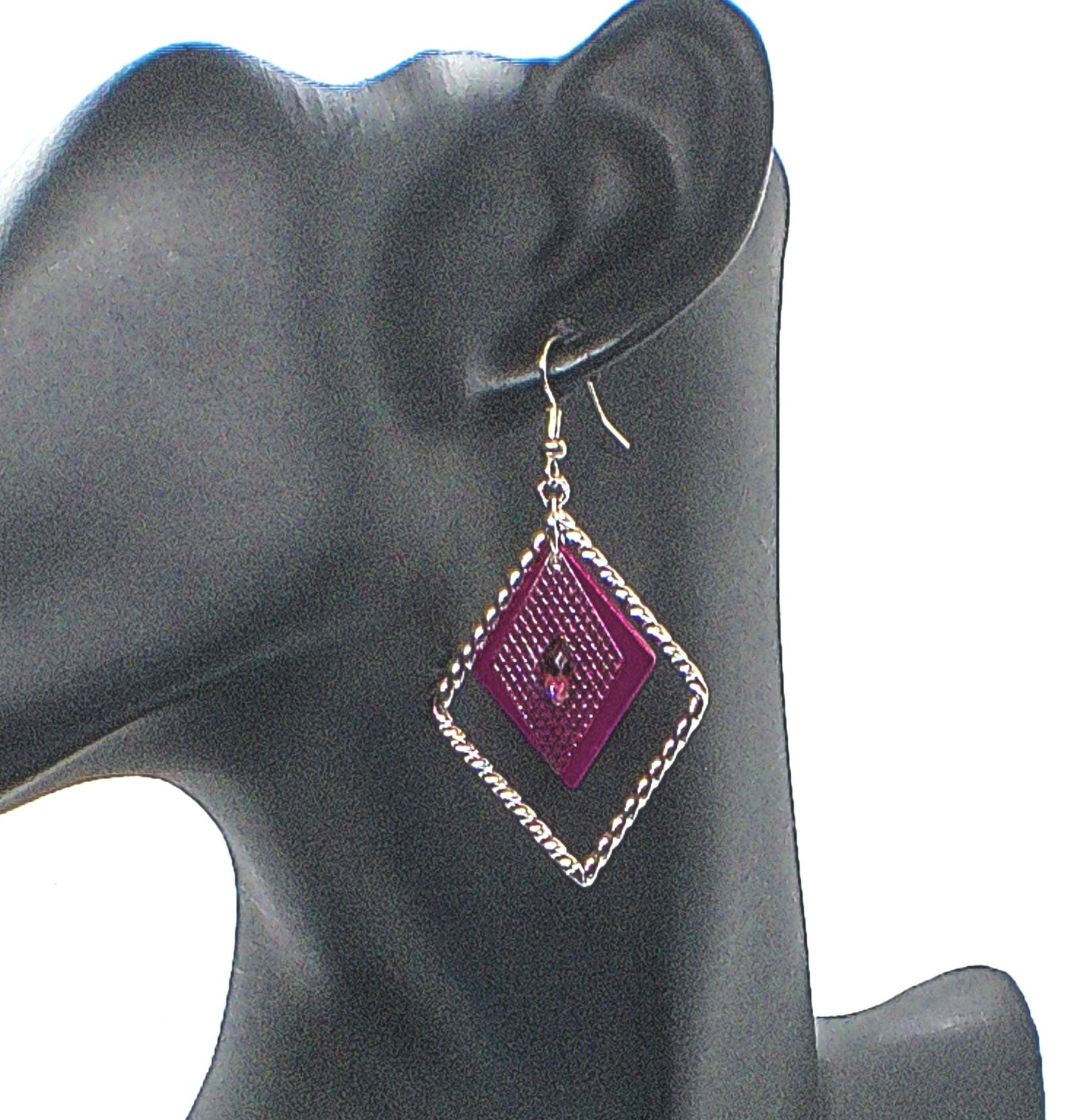 https://www.artistryjewelry.net/products/charming-triangle-earrings