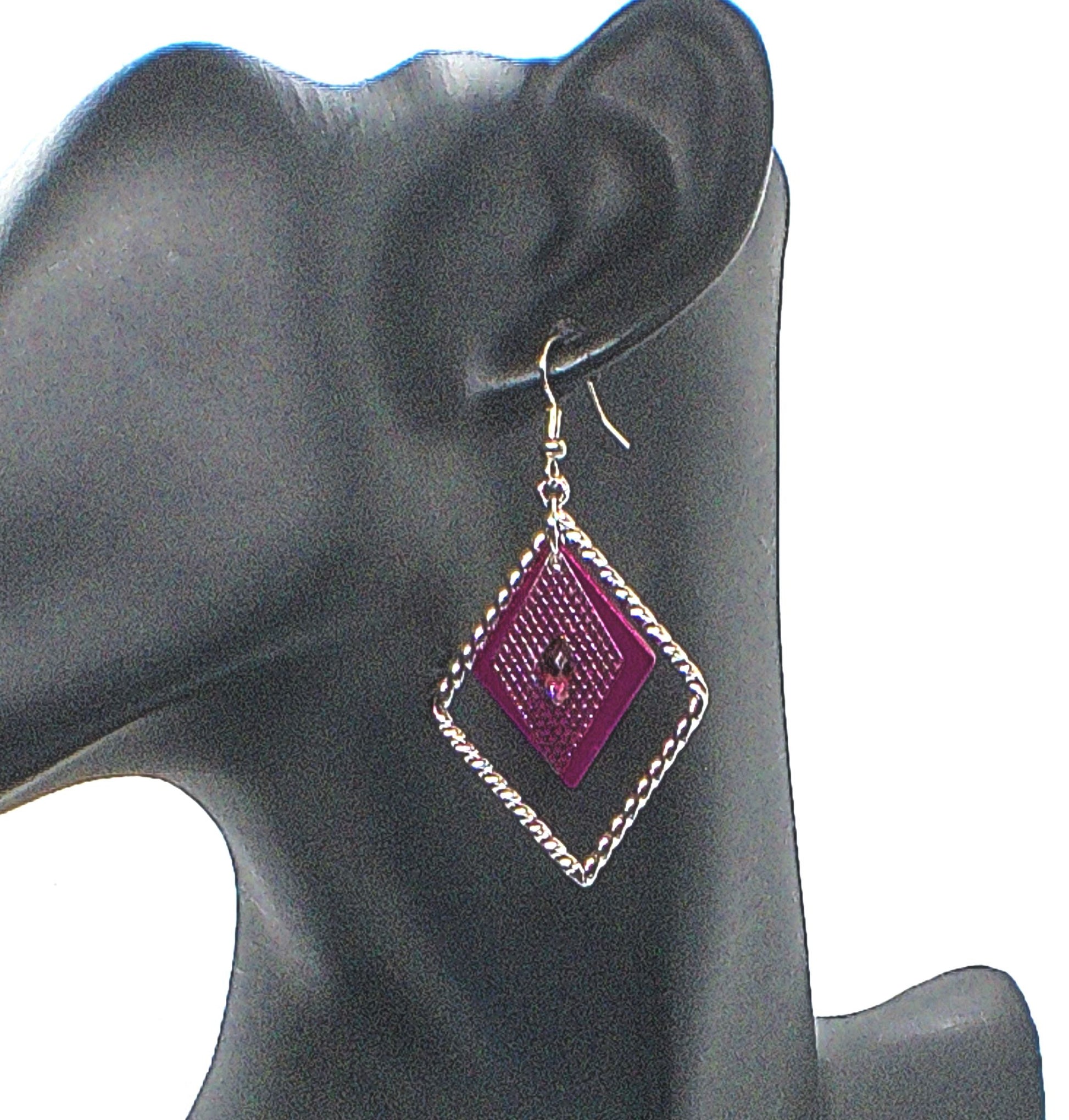 https://www.artistryjewelry.net/products/charming-triangle-earrings