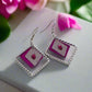 https://www.artistryjewelry.net/products/charming-triangle-earrings