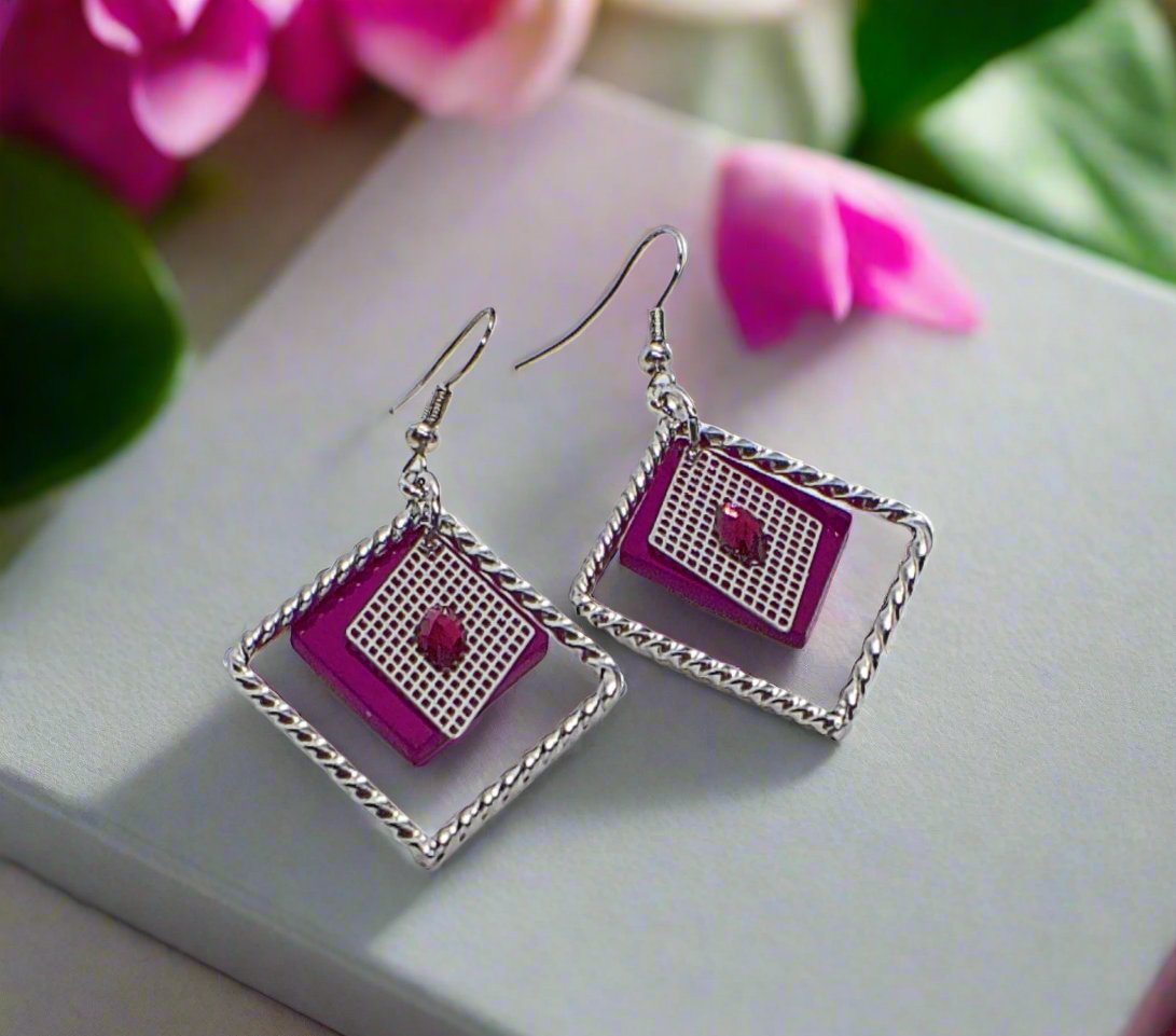 https://www.artistryjewelry.net/products/charming-triangle-earrings