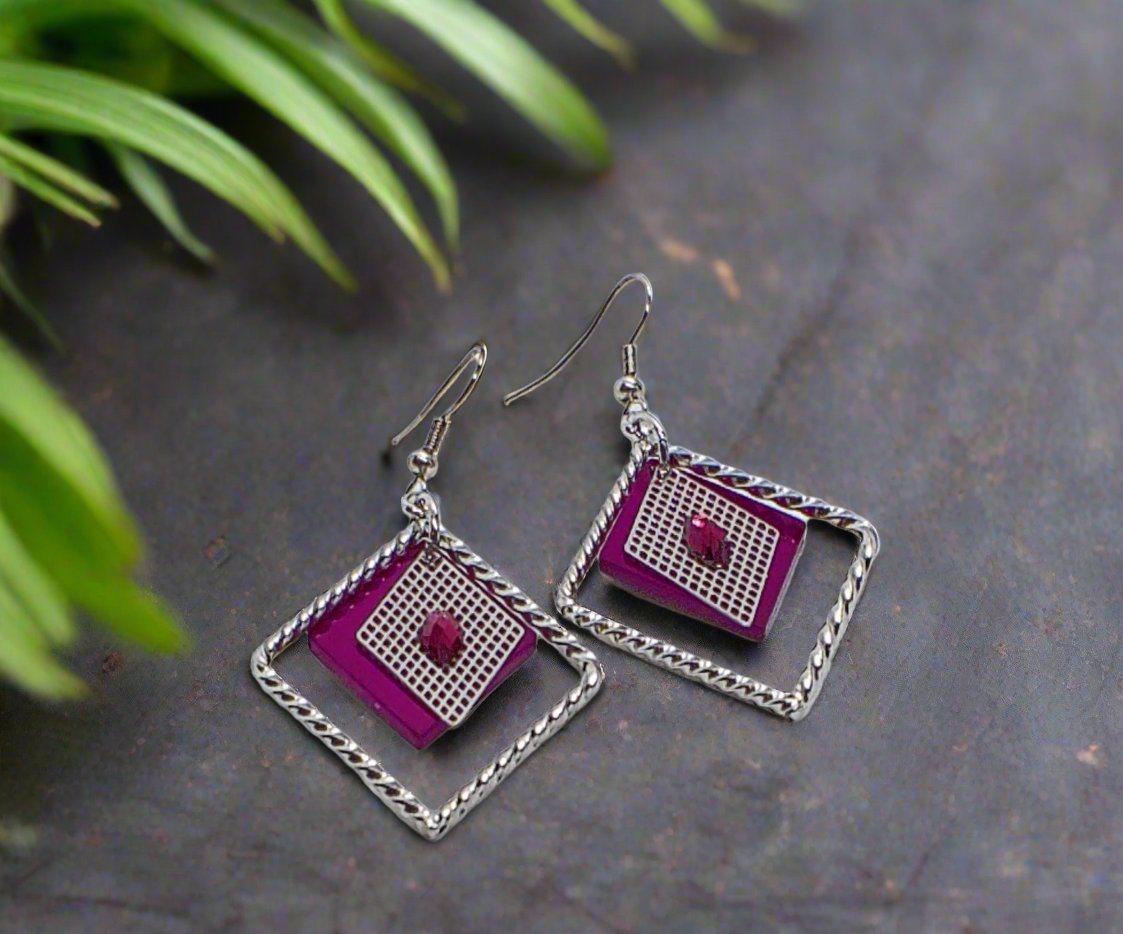 https://www.artistryjewelry.net/products/charming-triangle-earrings