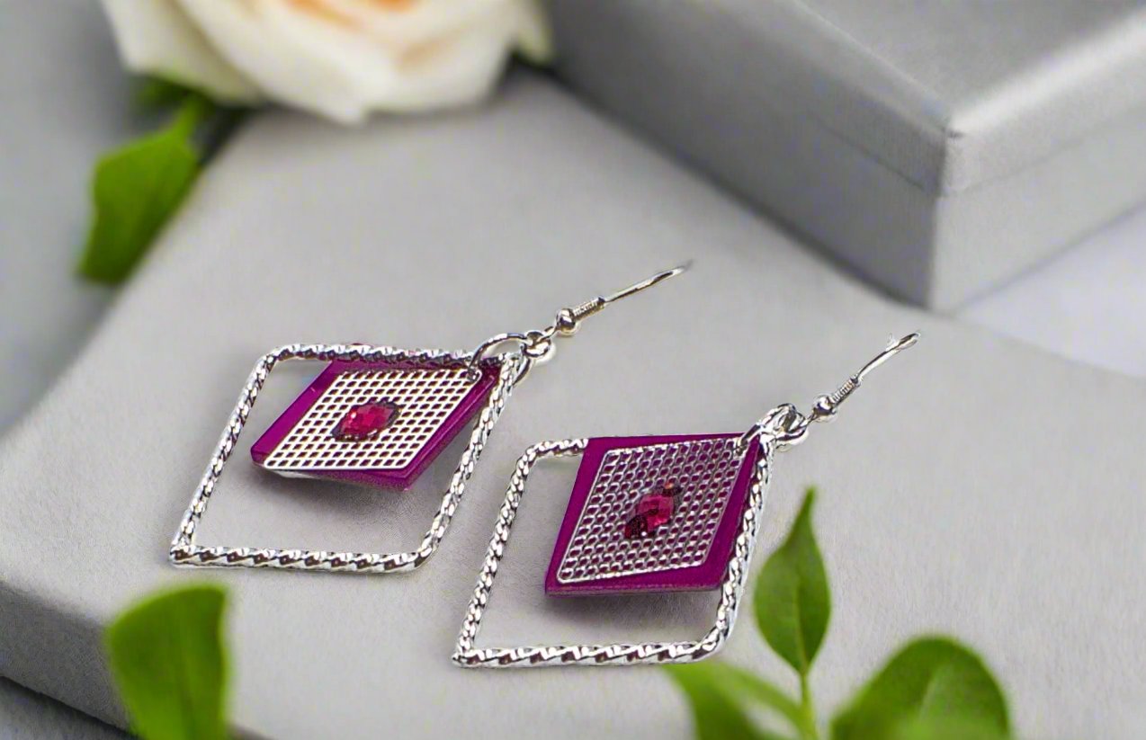 https://www.artistryjewelry.net/products/charming-triangle-earrings