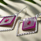 https://www.artistryjewelry.net/products/charming-triangle-earrings