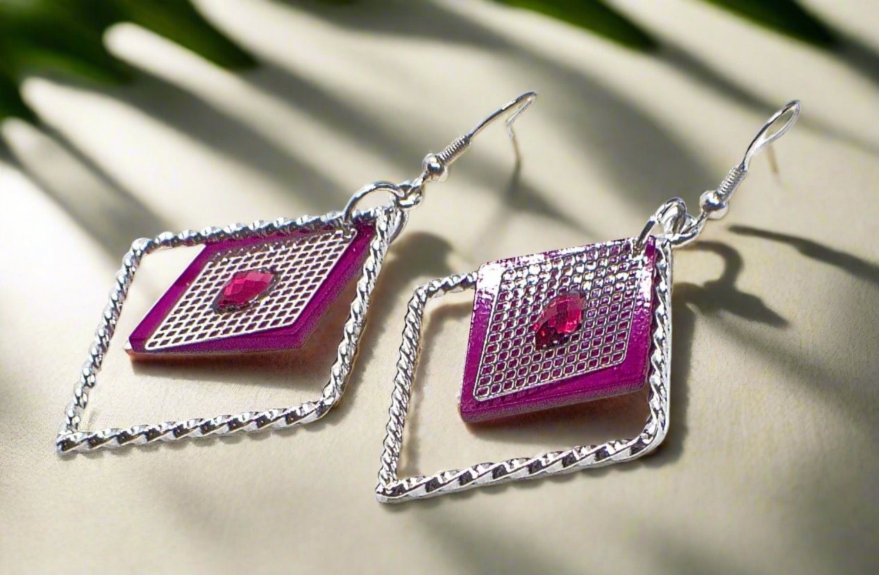 https://www.artistryjewelry.net/products/charming-triangle-earrings