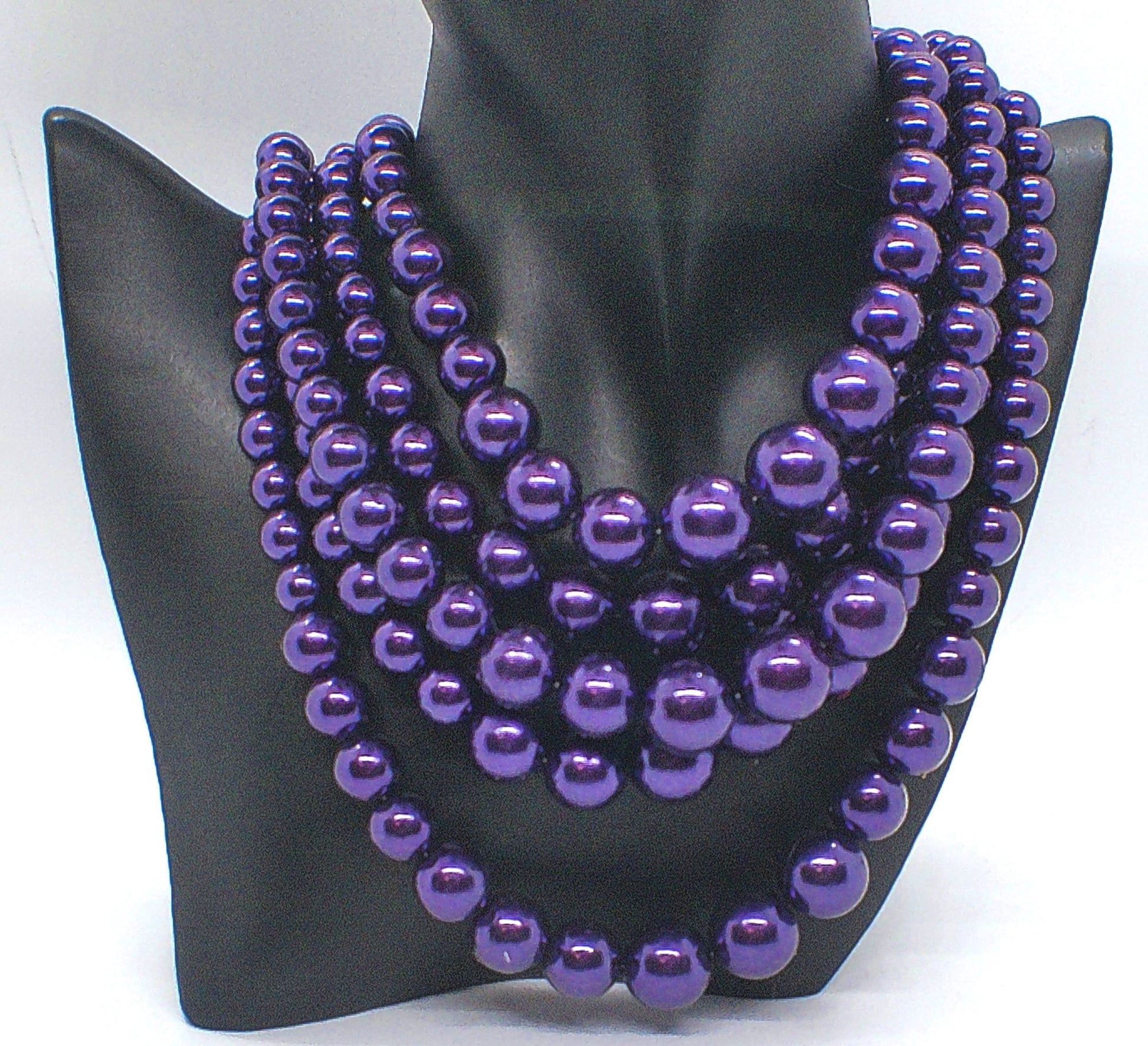 https://www.artistryjewelry.net/products/gorgeous-purple-multi-strand-necklace-set