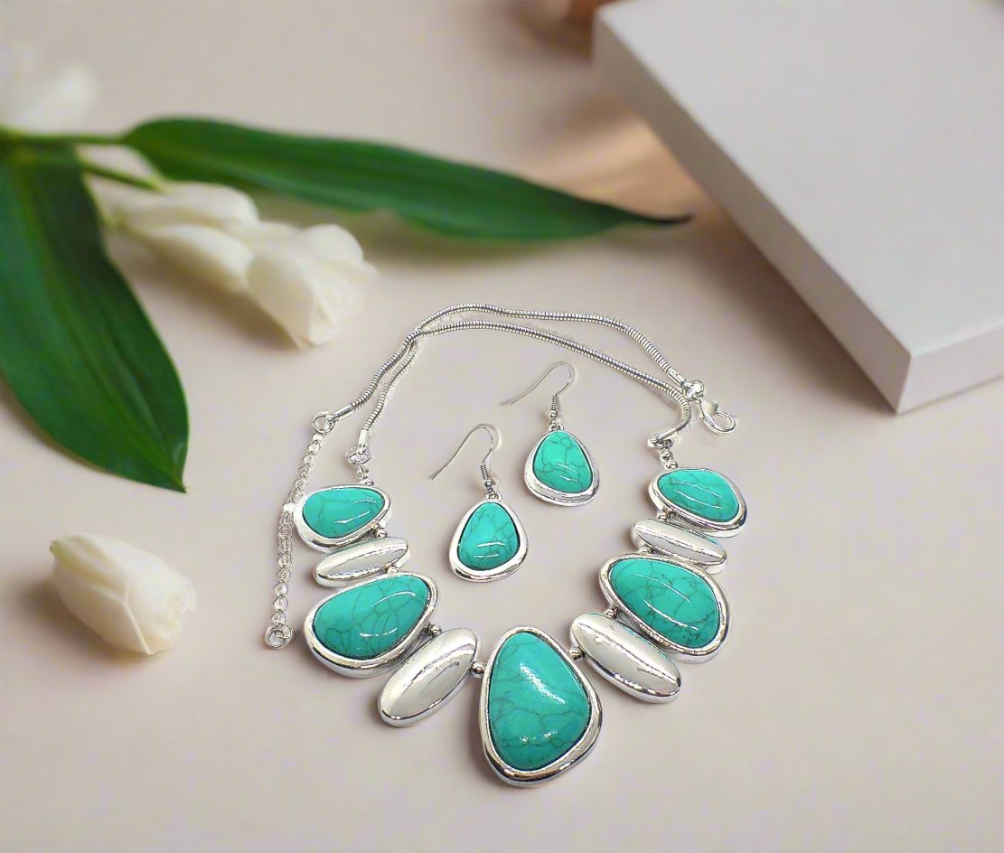https://www.artistryjewelry.net/products/fabulous-turquoise-and-silver-necklace-set