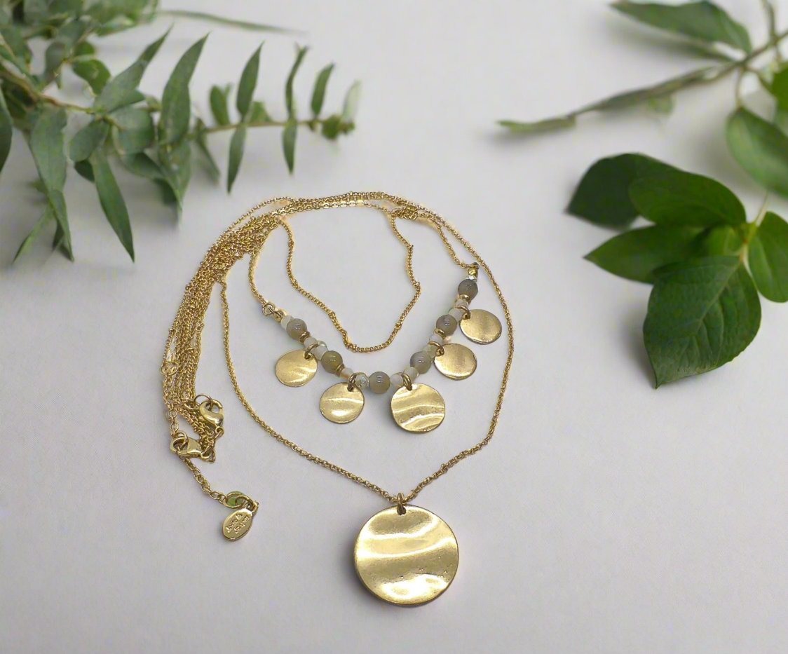 https://www.artistryjewelry.net/products/lovely-beige-multi-strand-necklace