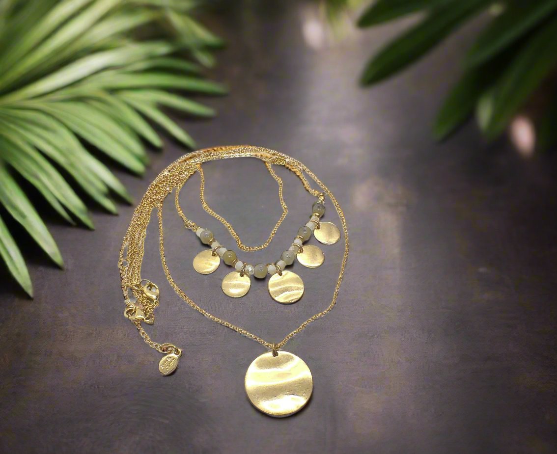 https://www.artistryjewelry.net/products/lovely-beige-multi-strand-necklace