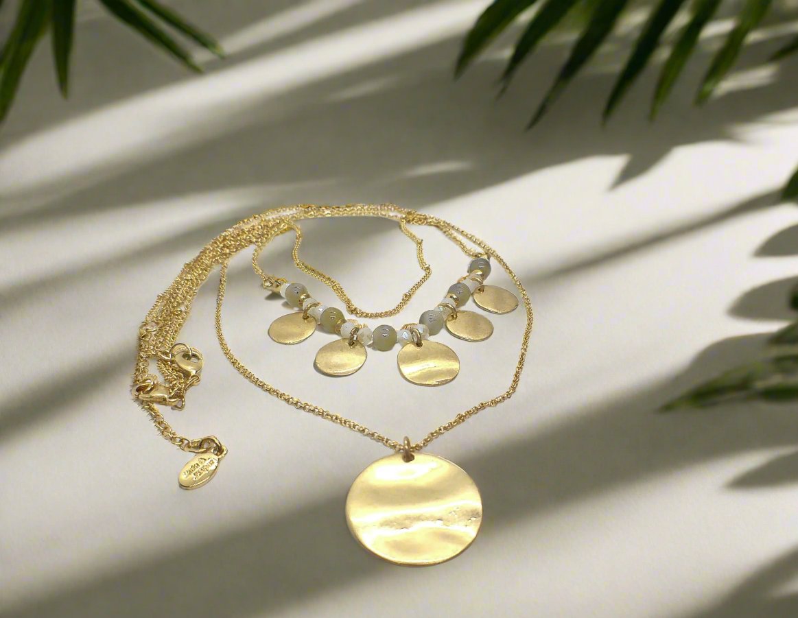 https://www.artistryjewelry.net/products/lovely-beige-multi-strand-necklace