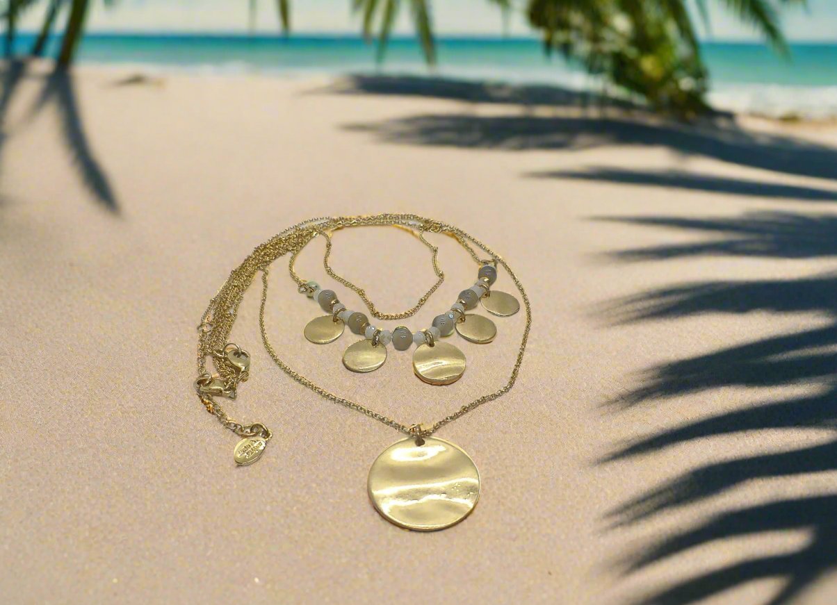 https://www.artistryjewelry.net/products/lovely-beige-multi-strand-necklace