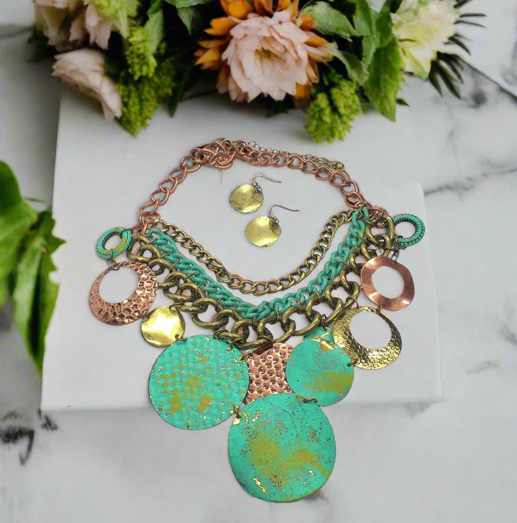 https://www.artistryjewelry.net/products/green-patina-dangle-necklace-set
