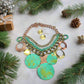 https://www.artistryjewelry.net/products/green-patina-dangle-necklace-set